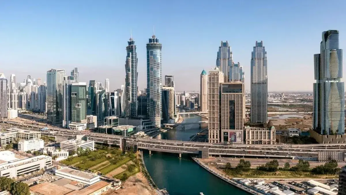 Panoramic view of Business Bay skyline and the Dubai Water Canal, showcasing prime properties by Casttio