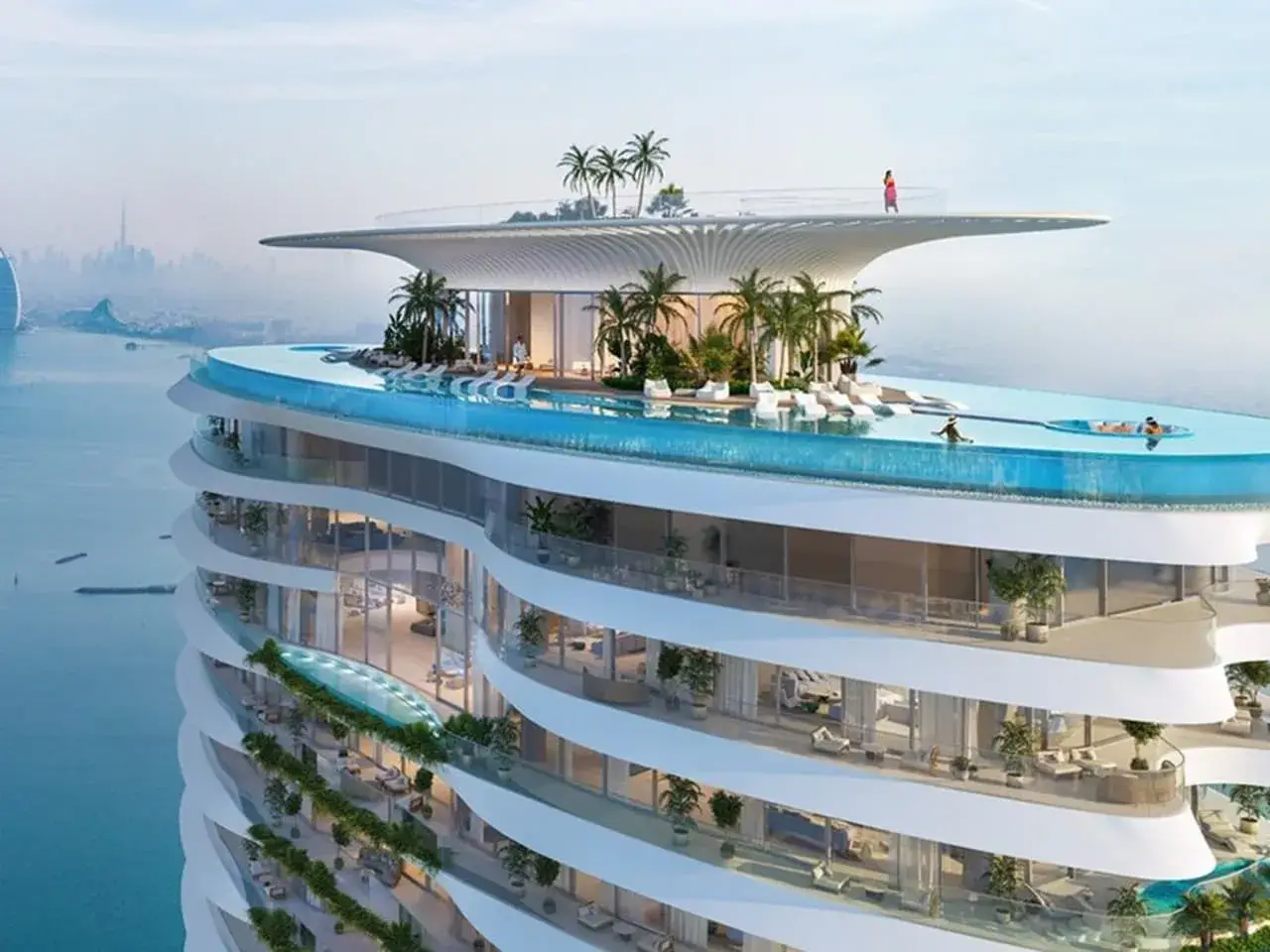 Futuristic luxury residential building in Dubai featuring a massive rooftop sky pool and tropical landscaping, presented by Casttio.